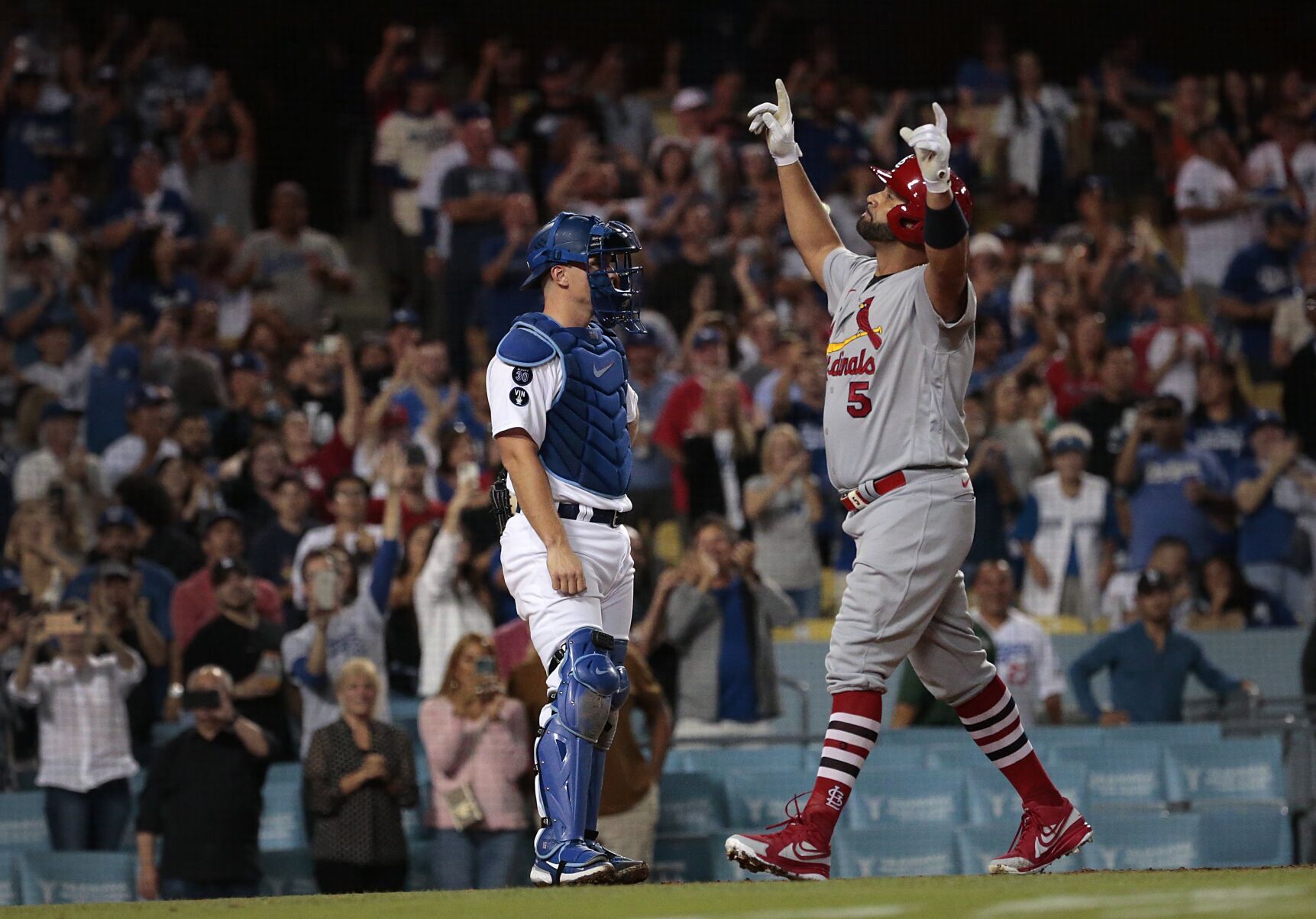 Pujols hits 699